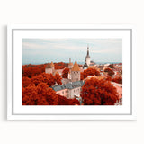 Textured abstract art print depicting a serene European landscape in muted earth tones, framed with a white mat.