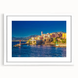 Textured abstract art print of a Corsican landscape in muted earth tones on a framed white mat, suitable for bedroom decor.