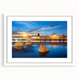 Textured abstract art print of Lyon cityscape in muted earth tones on a white-framed mat, suitable for bedroom art.