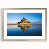 Extra large abstract art print of a textured European scenery in muted earth tones, framed in silver.