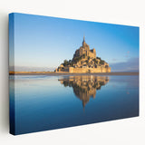Large art depicting a serene French landscape on stretched canvas, with muted green and blue tones.