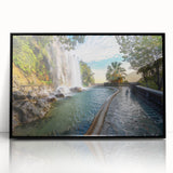 Large abstract wall art depicting a stylized French landscape in muted earth tones, framed in black acrylic.