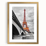 Abstract art print of the Paris skyline in muted gold and gray tones on a framed canvas, suitable for dining room decor.