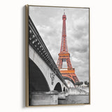 Framed canvas of a vintage Paris landscape in black and gold tones, ideal for bedroom wall art.