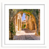 Textured art depicting an abstract Provence landscape in muted earth tones on a framed white mat, suitable for bedroom decor.