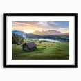 Colorful abstract art print of a Bavarian landscape on textured canvas, framed in black, ideal for living room decor.