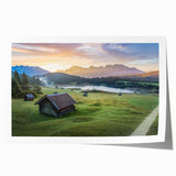 Rolled print of a Bavarian landscape featuring floral foreground and mountain backdrop, in muted earth tones.