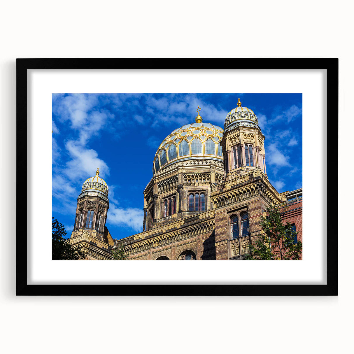 Abstract art print of Berlin scenery in vibrant colors on a large, textured canvas, framed in black.