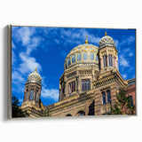 Landscape art painting of Berlin, featuring colorful buildings and a black sky, printed on a silver-framed canvas.