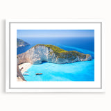 Textured abstract art print of a Greek landscape in muted earth tones on a framed white mat, ideal for bedroom art.