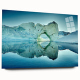 Large abstract wall art print of a Greenland scenery in muted green and blue tones on acrylic glass.