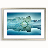 Extra large abstract art print of Greenland scenery in muted green and blue tones, framed with a silver mat.