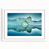 Textured art print of abstract Greenland scenery in muted green and white hues, framed with a white mat.