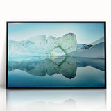 Large abstract wall art depicting a Greenlandic landscape in muted green and blue shades, framed in black acrylic.