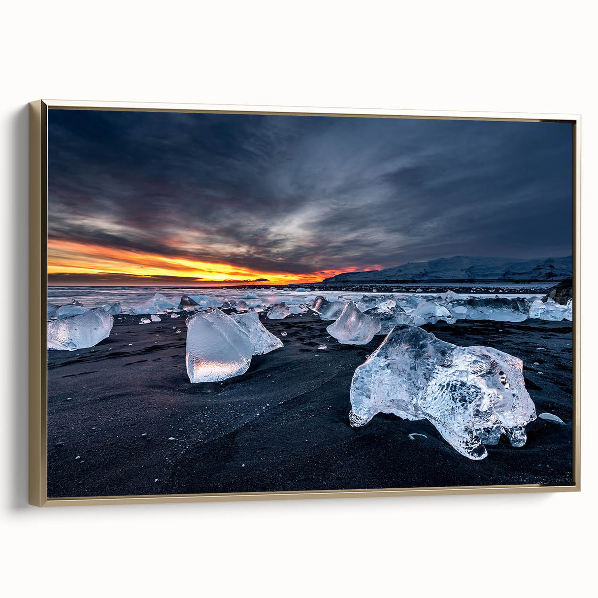 Framed canvas wall art featuring a vintage-style Icelandic landscape in muted gold and black tones, ideal for bedroom decor.