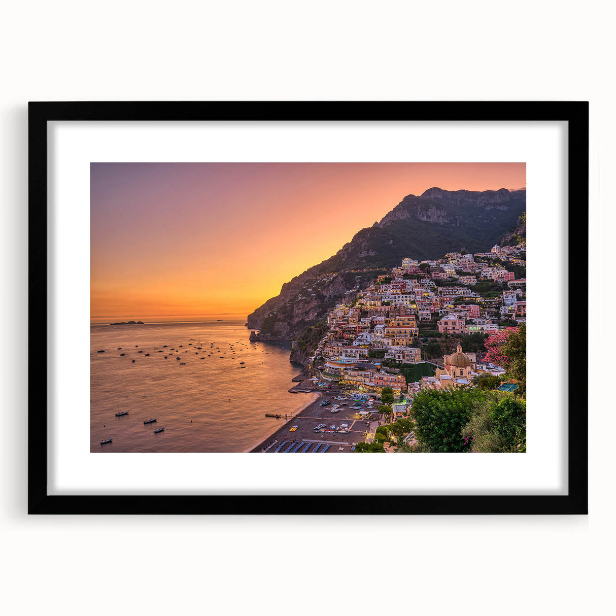 Colorful abstract art print of the Amalfi Coast in vibrant hues on a textured, extra large canvas, framed in black.