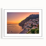 Textured art print of the Amalfi Coast in muted blue and white tones, framed with a white mat, suitable for bedroom decor.