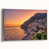 Framed canvas featuring a vintage-style landscape painting of the Amalfi Coast in vibrant colors.