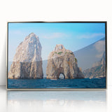 Large art print of Capri, Italy scenery in mid-century modernist style, using muted blue and green tones on framed acrylic.