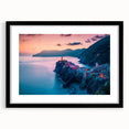 Colorful art of Cinque Terre with abstract prints and textures, in a large black-framed matte, ideal for living room decor.