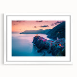 Textured art depicting the Cinque Terre coastline in muted earth tones, framed with a white mat, suitable for bedroom art.