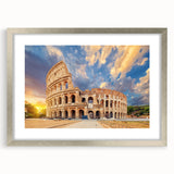 Extra large wall art featuring a textured print of the Colosseum in Rome with muted earth tones, framed in silver.
