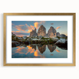 Abstract art print of the Dolomites in muted earth tones on a framed canvas, suitable for dining room decor.