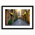 Abstract art print of Florence skyline in vibrant hues on a large, framed black canvas, ideal for living room decor.