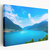 Large canvas print of Lake Como, featuring soft blue and green hues, ideal for kitchen wall art.
