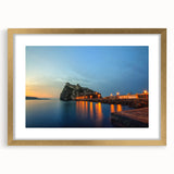 Abstract art print of Naples with muted gold and blue tones on a framed canvas, ideal for dining room decor.