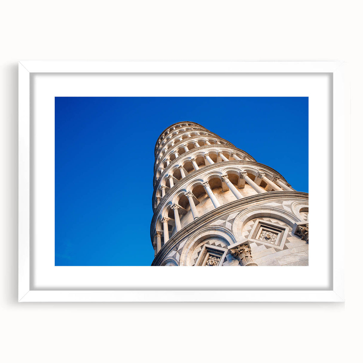 Textured art print of the Leaning Tower of Pisa in muted earth tones, framed with a white mat, ideal for bedroom art.