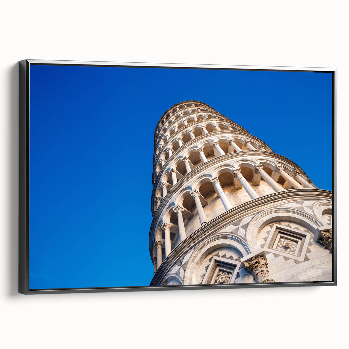Black and white wall art featuring a vintage poster-style landscape of Pisa, Italy on a framed canvas.