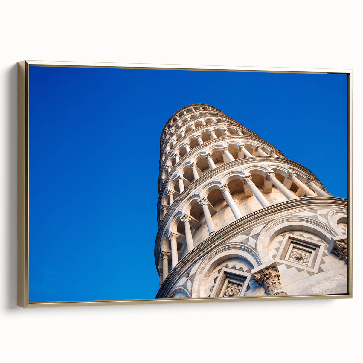 Framed canvas featuring a vintage-style landscape painting of the Leaning Tower of Pisa in muted gold and black tones.