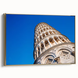 Framed canvas featuring a vintage-style landscape painting of the Leaning Tower of Pisa in muted gold and black tones.