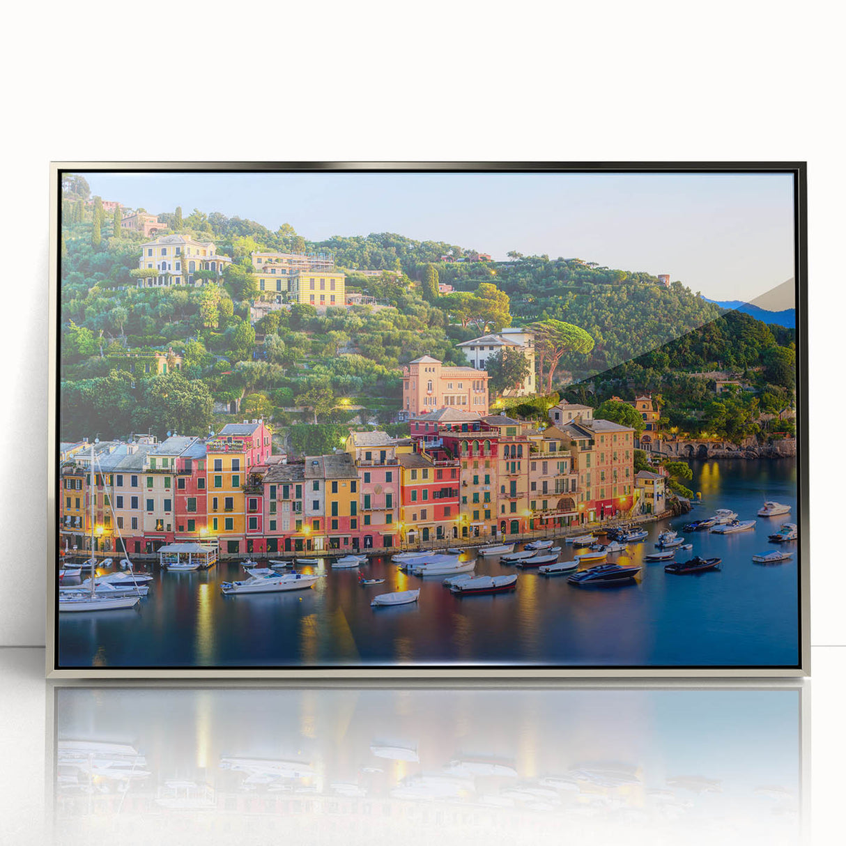 Large art print of Portofino, Italy, in silver-framed acrylic, featuring mid-century modernist style.