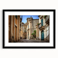 Extra large abstract art print depicting a colorful, textured Sicilian landscape in a black frame.