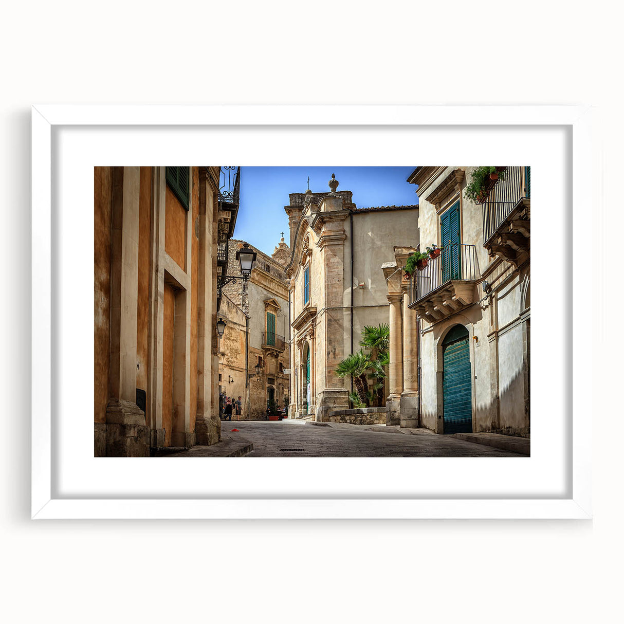 Textured art print of an abstract Sicilian landscape in muted earth tones on a framed white mat, suitable for bedroom decor.
