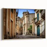 Framed canvas of a vintage-style Sicilian landscape in gold and black tones, ideal for bedroom wall art.
