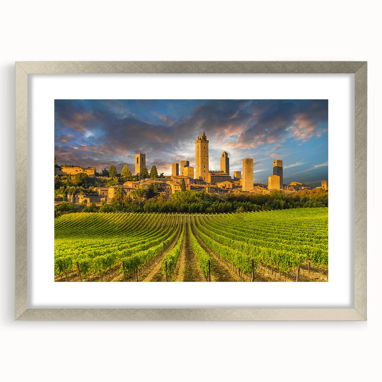 Extra large abstract art print of a Tuscan landscape in muted earth tones on a textured canvas, framed in silver.