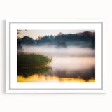 Textured abstract art print depicting a European scenery in muted earth tones, framed in white, suitable for bedroom decor.