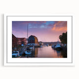 Textured art of abstract European scenery in muted earth tones on a framed white mat, ideal for bedroom ambiance.