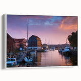 Vintage poster art of a scenic European landscape in vibrant colors on a large framed canvas, ideal for living room decor.