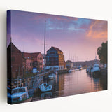 Large art print of a European Lithuanian landscape on stretched canvas, featuring muted green and blue tones.