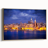 Framed canvas featuring a vintage-style landscape painting of Malta with a dominant black and gold color scheme.