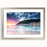 Extra large abstract art print of the Mediterranean Sea in textured style, with cool blue and white tones, framed in silver.