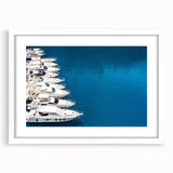 Textured abstract art print of Monaco scenery in muted earth tones, framed with a white mat, suitable for bedroom decor.