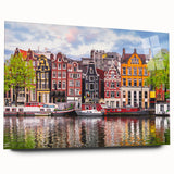 Large abstract wall art of European scenery in muted blue and green tones on acrylic glass.