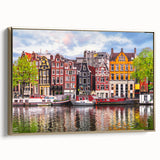 Framed canvas depicting a vintage-style Dutch landscape in muted gold and black tones, ideal for bedroom decor.