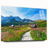 Large abstract wall art of a European scenery, in muted blue and green tones on acrylic glass.