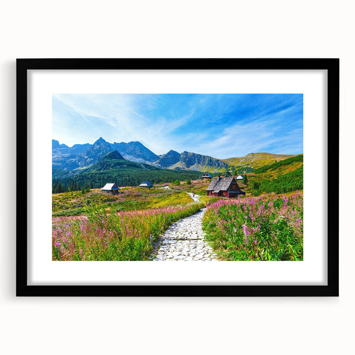 Extra large abstract art print of a colorful, textured European scenery on a black framed canvas.